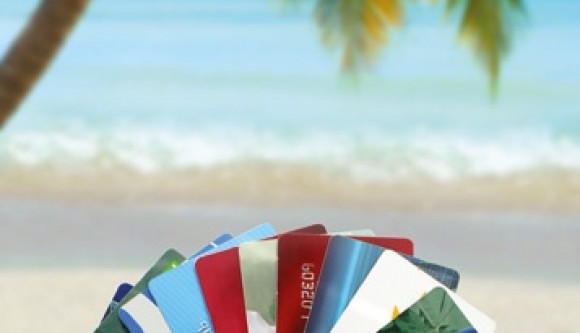 Photo of credit cards with beach scene as background